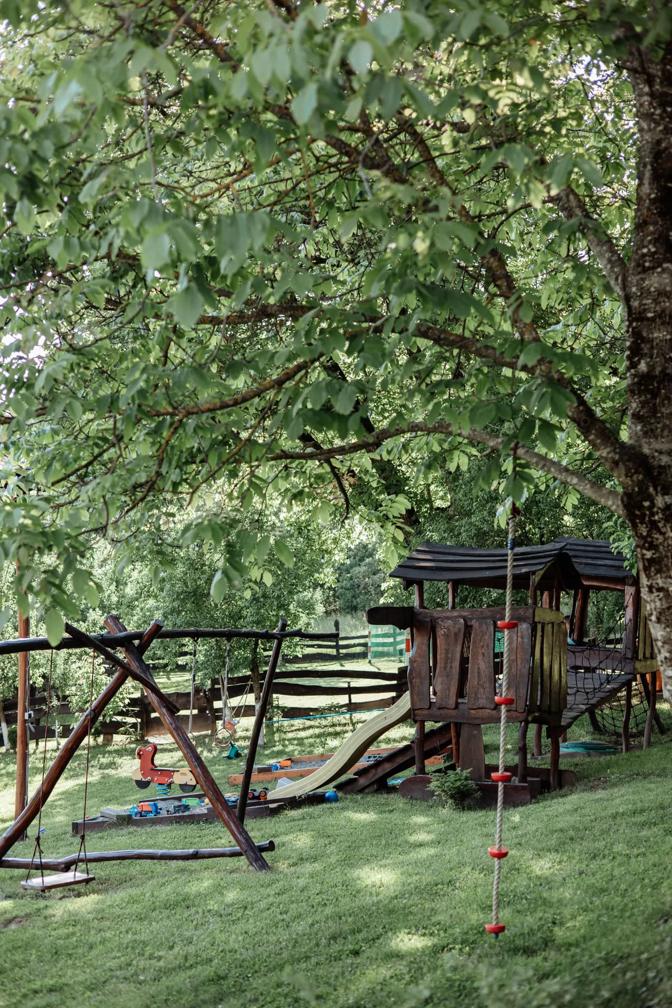 Children's playground with swings and a slide