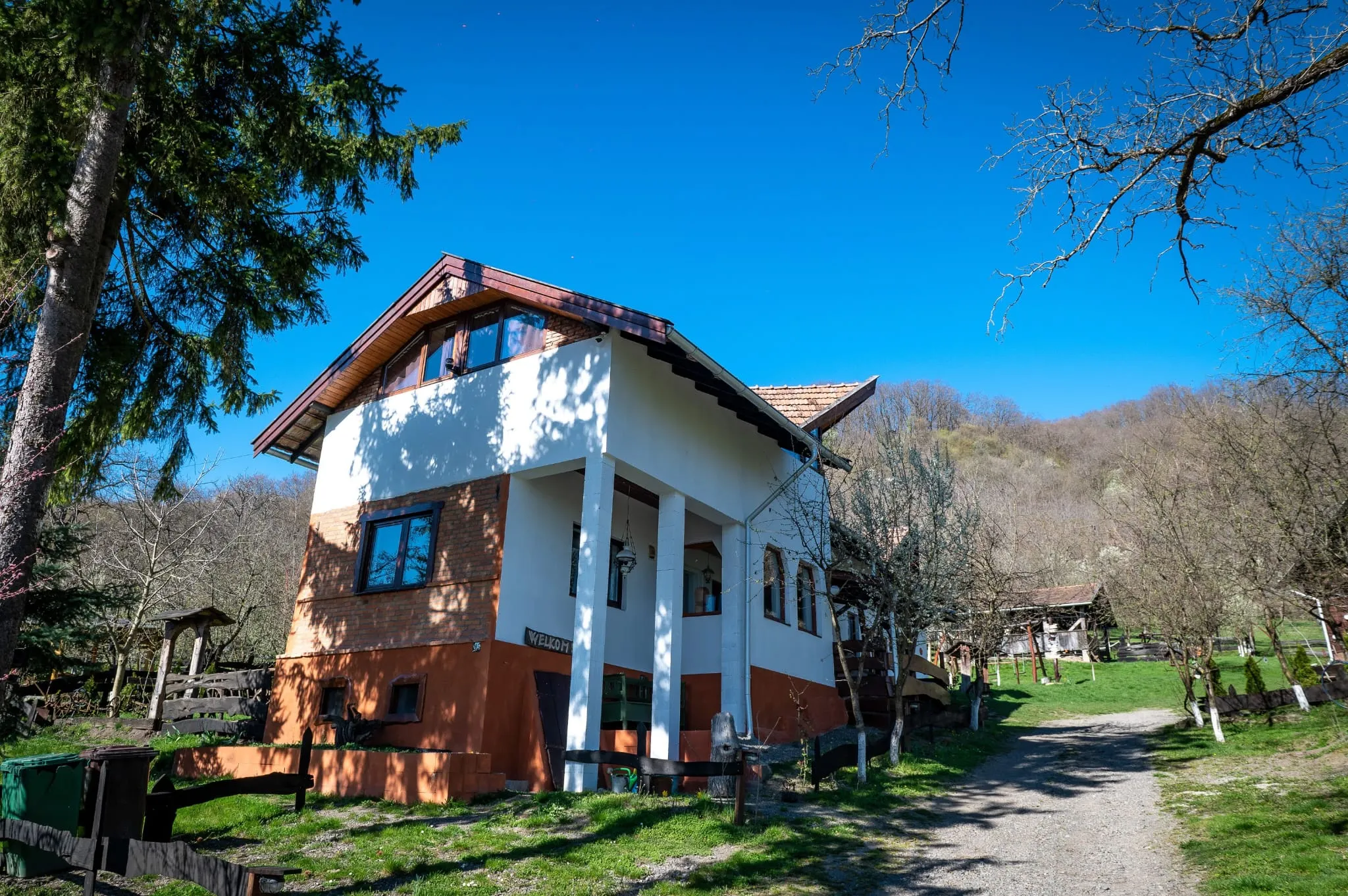 The main house on a bright spring day